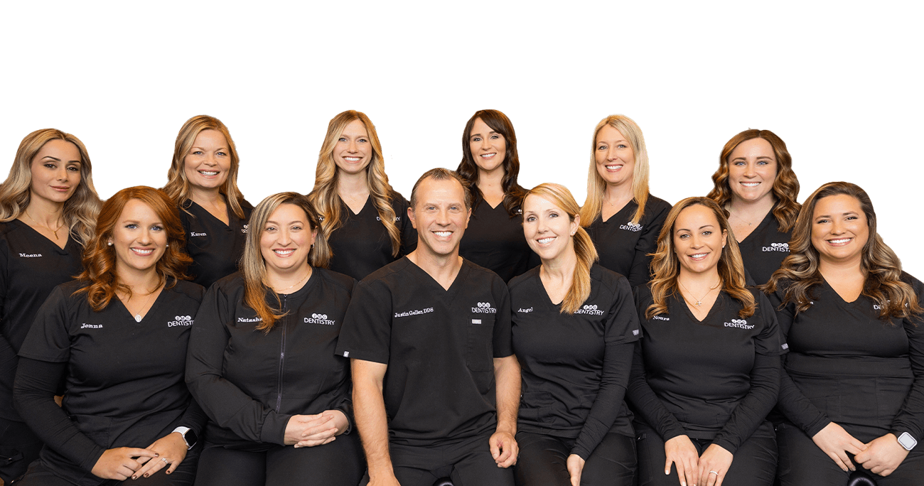 Smiling Novi dentist and dental team members at J M G Dentistry Family and Cosmetic Care