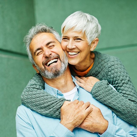 Portrait of laughing, happy senior couple