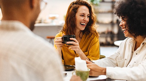 friends enjoying coffee together